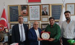 ÇALIŞMA VE BAŞARILARINDAN DOLAYI İDARECİ VE BÜROKRATLAR BİRLİĞİ BAŞKANI YÜCEL CAN'A PLAKET...